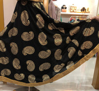 Exclusive Design Print wide skirt with Broad Golden Zari Border all around