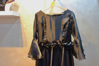 Mysteriously Elegant Black Satin Gown with Bell Sleeves